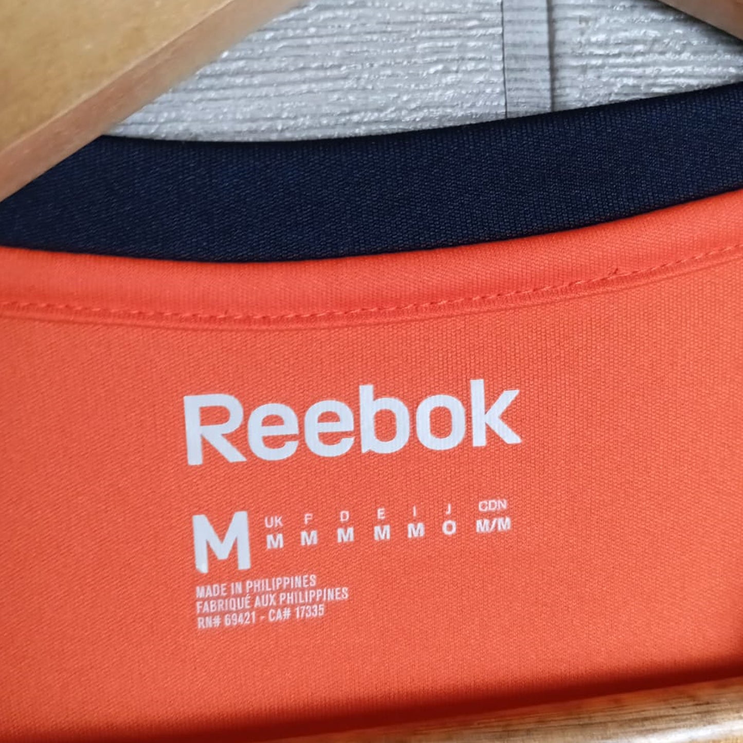 Reebok Wor Tech Top Orange One Piece T-Shirt - Diseños