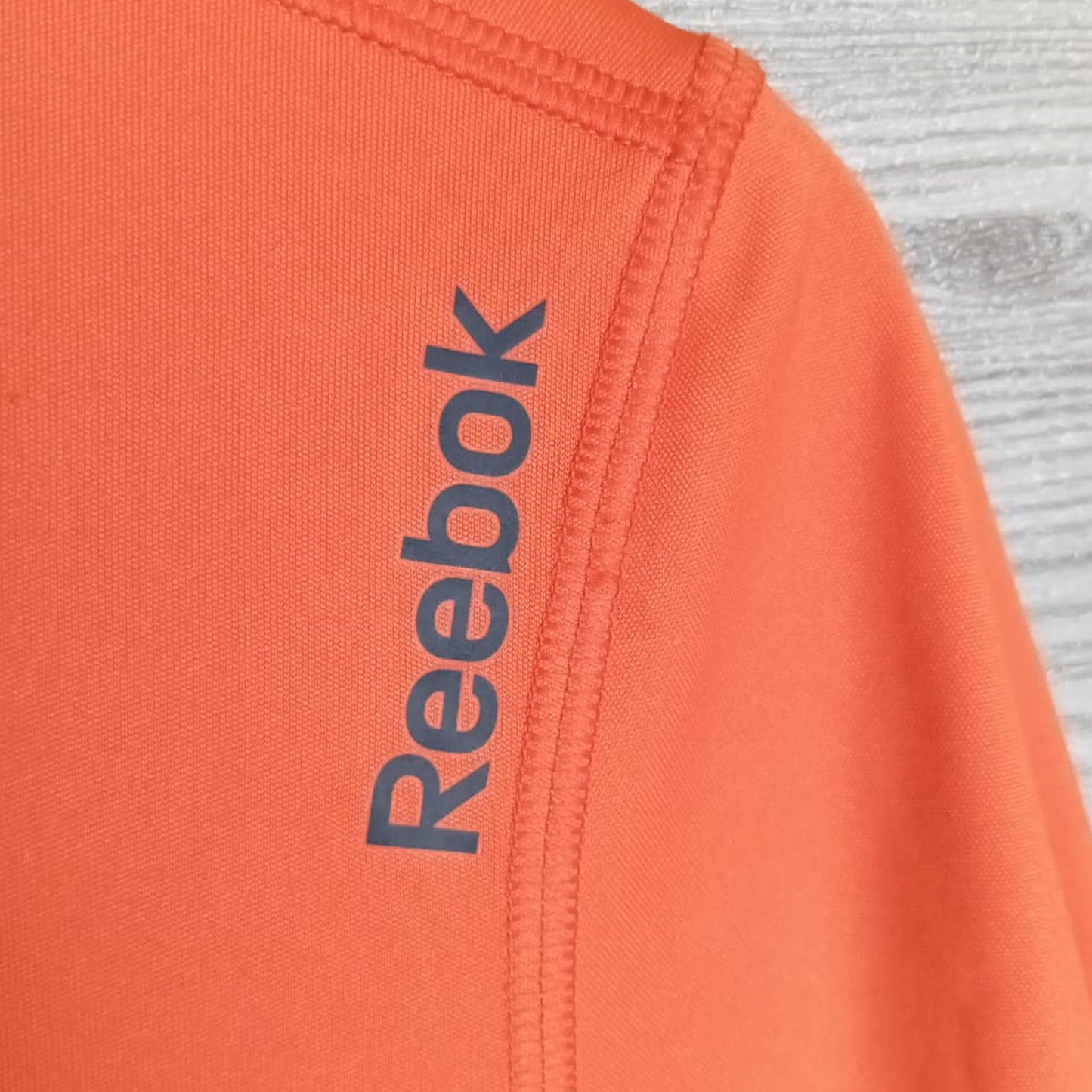 Reebok Wor Tech Top Orange One Piece T-Shirt - Diseños